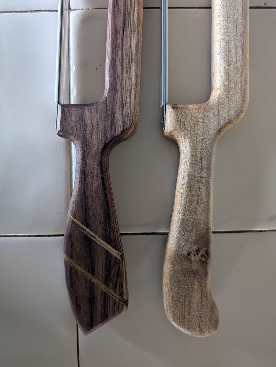 Two wooden bow bread knives